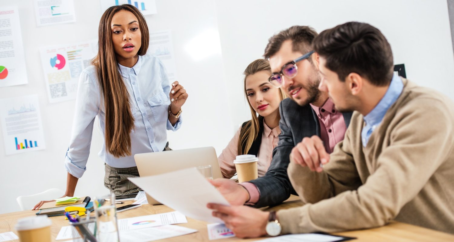 multicultural-group-of-marketing-managers-working-on-project-together-in-office.jpg